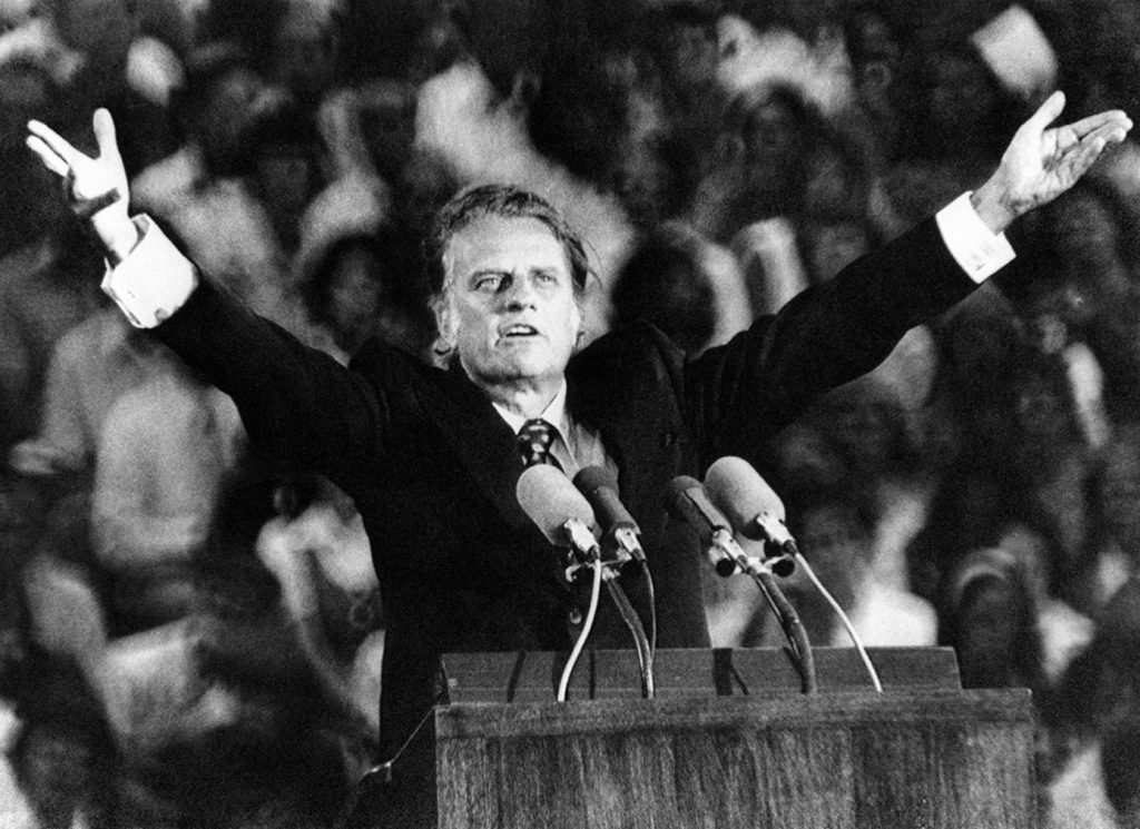 EVANGELIST BILLY GRAHAM PREACHES THE GOSPEL AT THE UPPER MIDWEST CRUSADE, SAINT PAUL, MINNESOTA, on JULY 13, 1973. Courtesy: CSU ARC